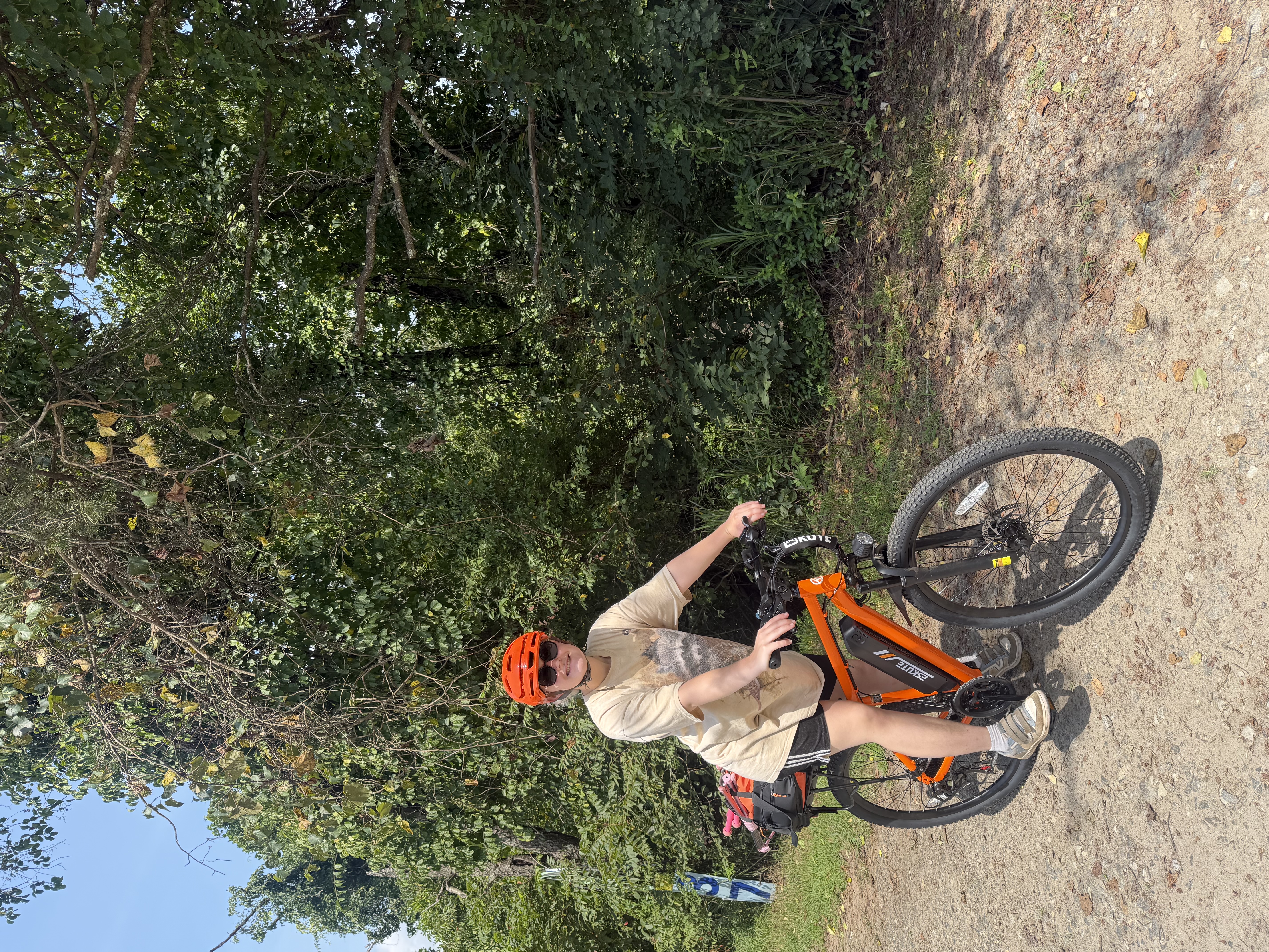 Guests riding e-bikes through Asheville